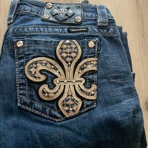 Miss Me bootcut jeans size 27 small fray at bottom. Never been put in dryer